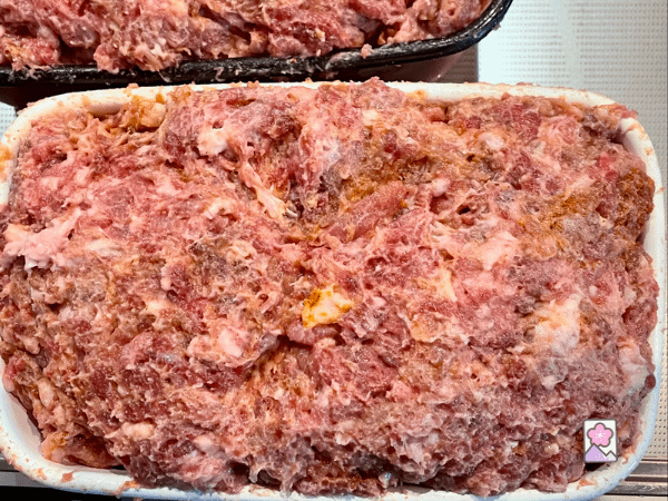 Bologna meat mixture packed in a terrine
