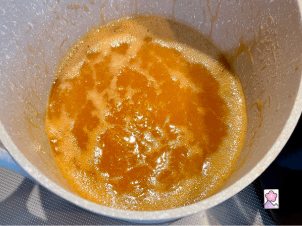 Sweet caramel bubbling in a saucepan