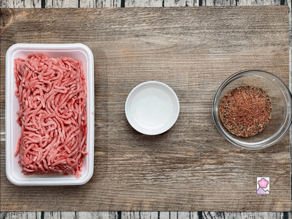 Pork, Sausage Spice and water on a plank are the only ingredients needed to make Sweet Italian Sausage