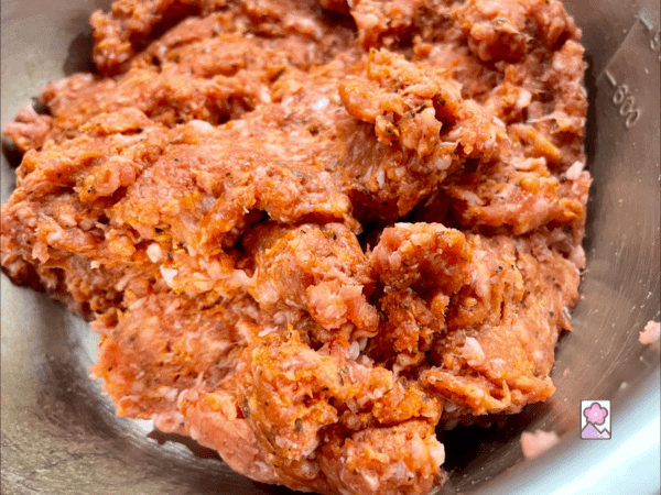 Sweet Italian Sausage meat mixture in a bowl