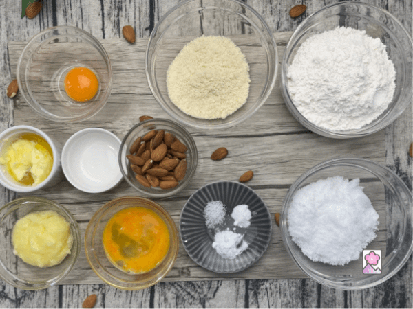 Ingredients for Chinese Almond Cookies on a board
