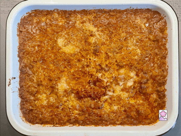 Youvetsi cooling in a baking pan after coming out of the oven
