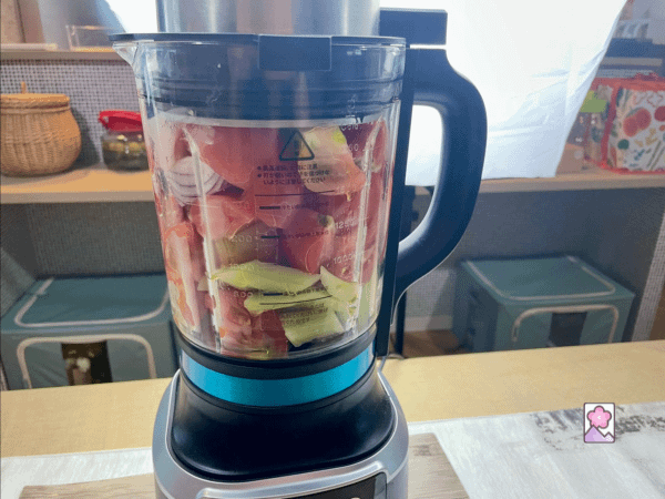 Gazpacho ingredients packed in a blender and ready to puree