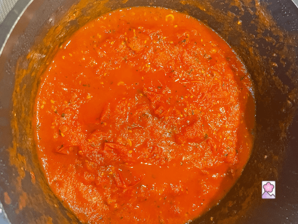 Savory tomato sauce is thick and chunky. loaded with tmatoes and basil.