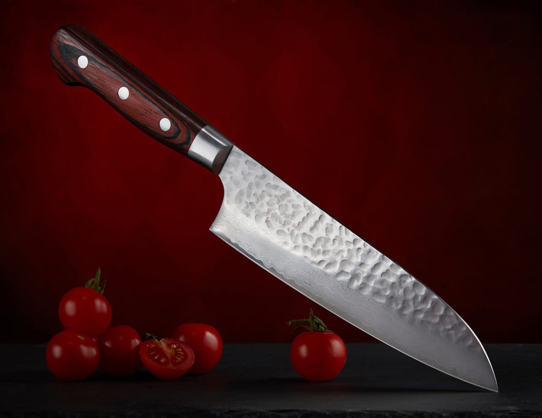 A Japanese cooking knife with a Western-style handle and a Japanese-style blade