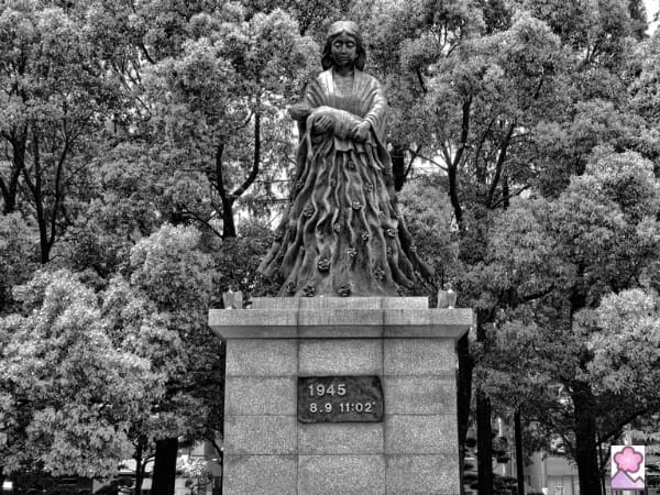 Statue of a woman holding a baby