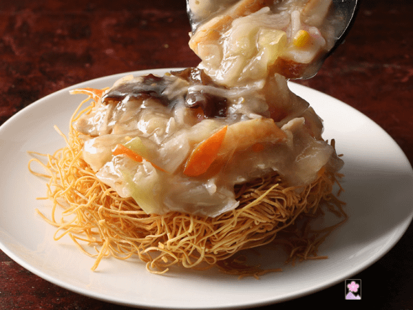 Sara Udon - crispy dried brown noodles topped with a starchy seafood sauce