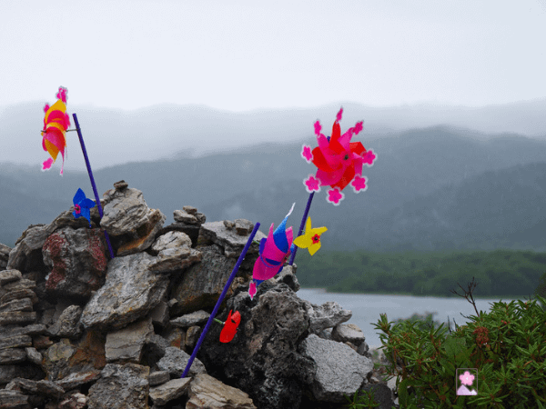 Toy windmills in Osore-zama stones
