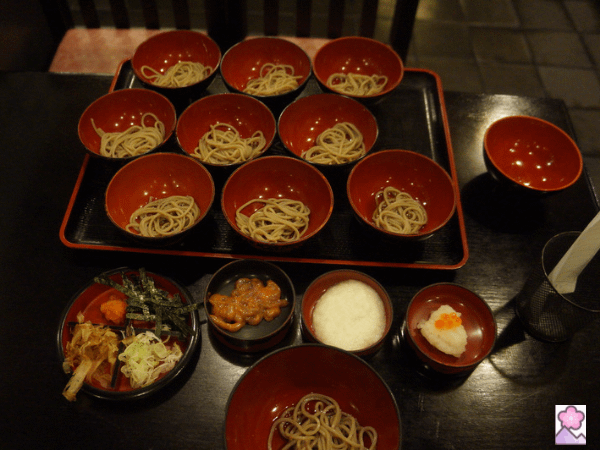 Wanton Soba lined up in many bowls on a tray