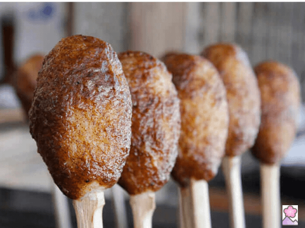 Flavors of Tohoku - shingoro rice balls browned on a skewer