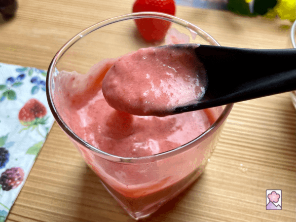 Strawberry Mousse being eaten with a spoon